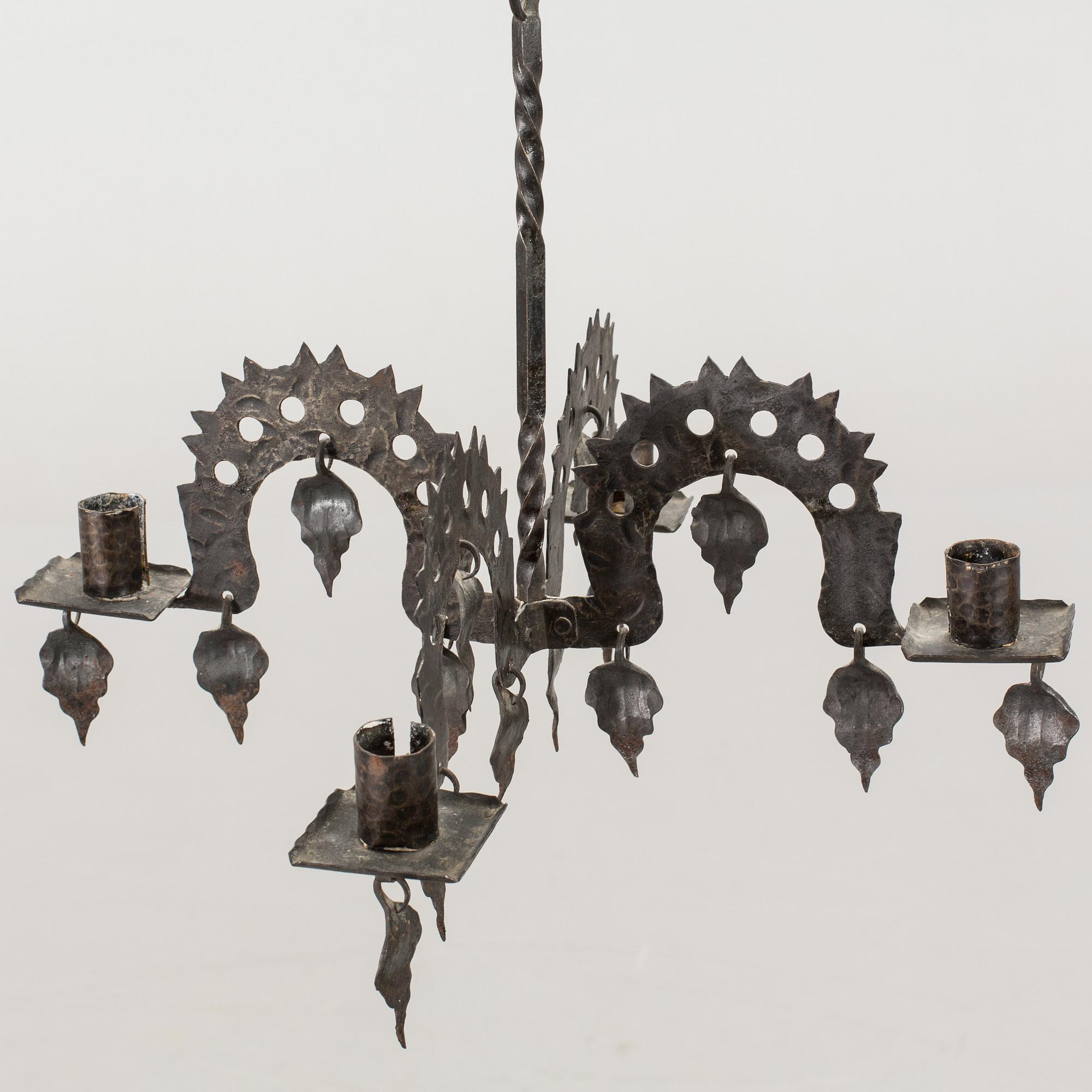 A FOLKLORE LAMP 20TH CENTURY.