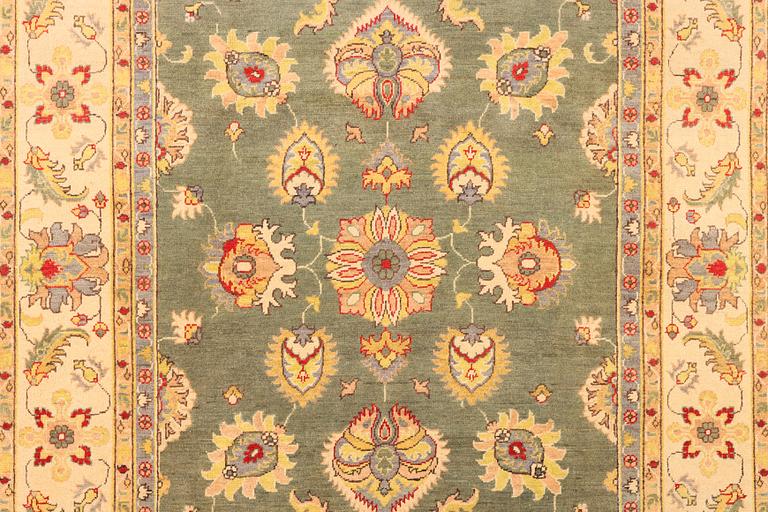 A Kazak carpet, c. 304 x 195 cm.