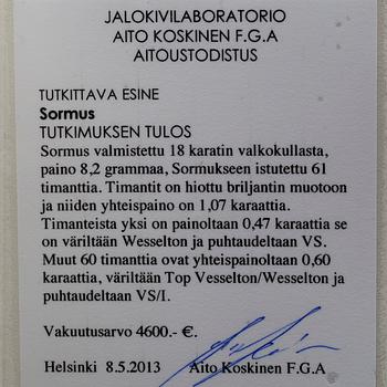 RING, vitguld 18K, briljantslipade diamanter, tot. 1,07 ct, mittsten 0,47 ct. Vikt 8,2 g. Intyg.