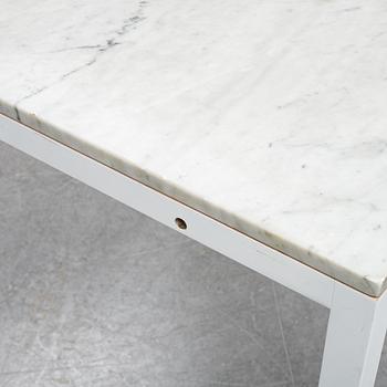 A marble top table, 21th century.