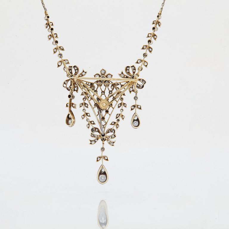Brosch/hänge 14K guld och silver med gammal- och rosenslipade diamanter.