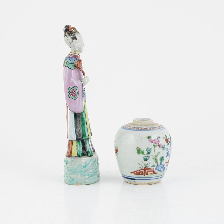 A Chinese famille rose porcelain figure and a jar, Qing dynasty (1644-1912).