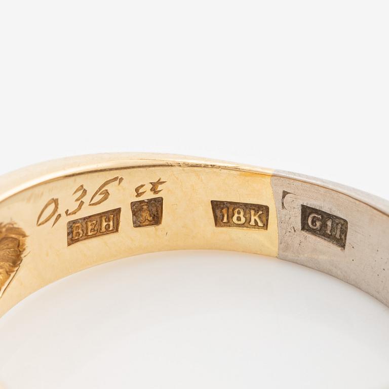 Ring 18K guld med en rund briljantslipad diamant.