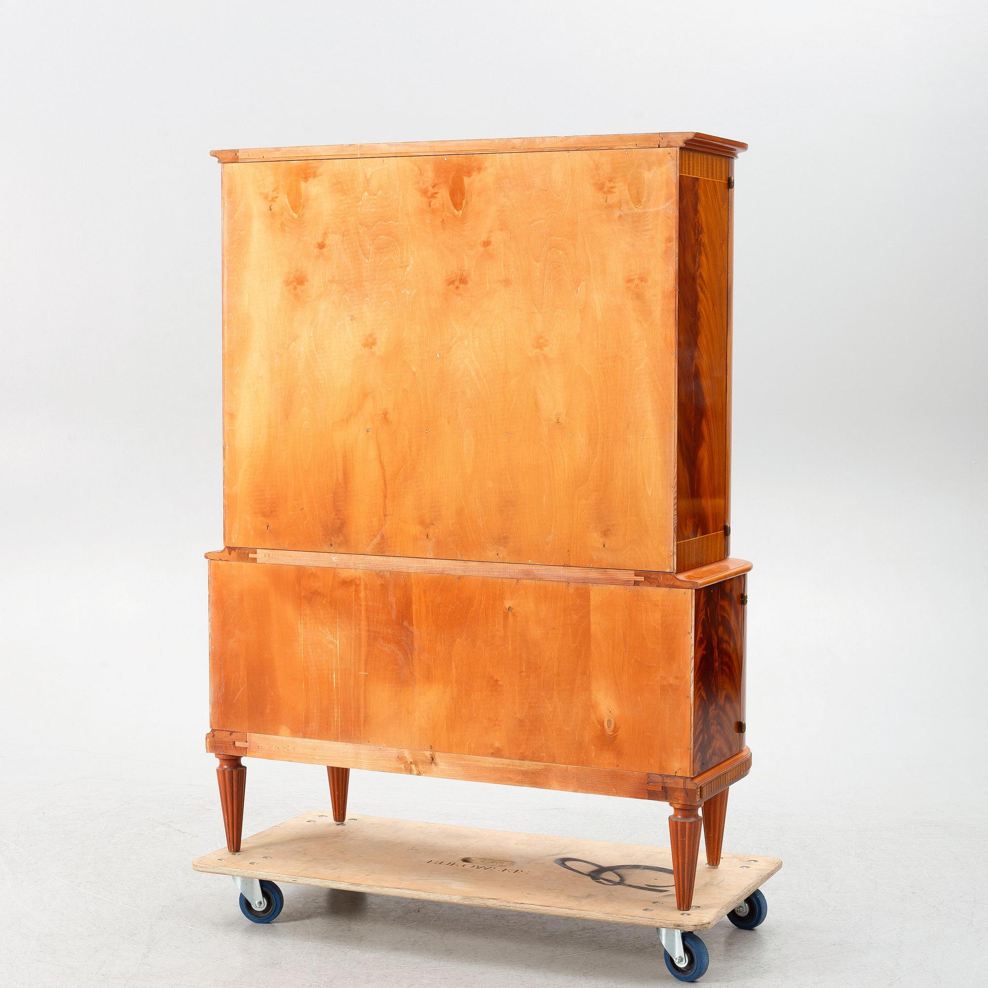 A Swedish Modern cabinet, mid 20th Century.