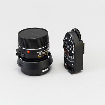 a black body Leica M4-P camera with no 1605951 made by Leitz Canada in 1982. With two lenses and a Leica Meter.