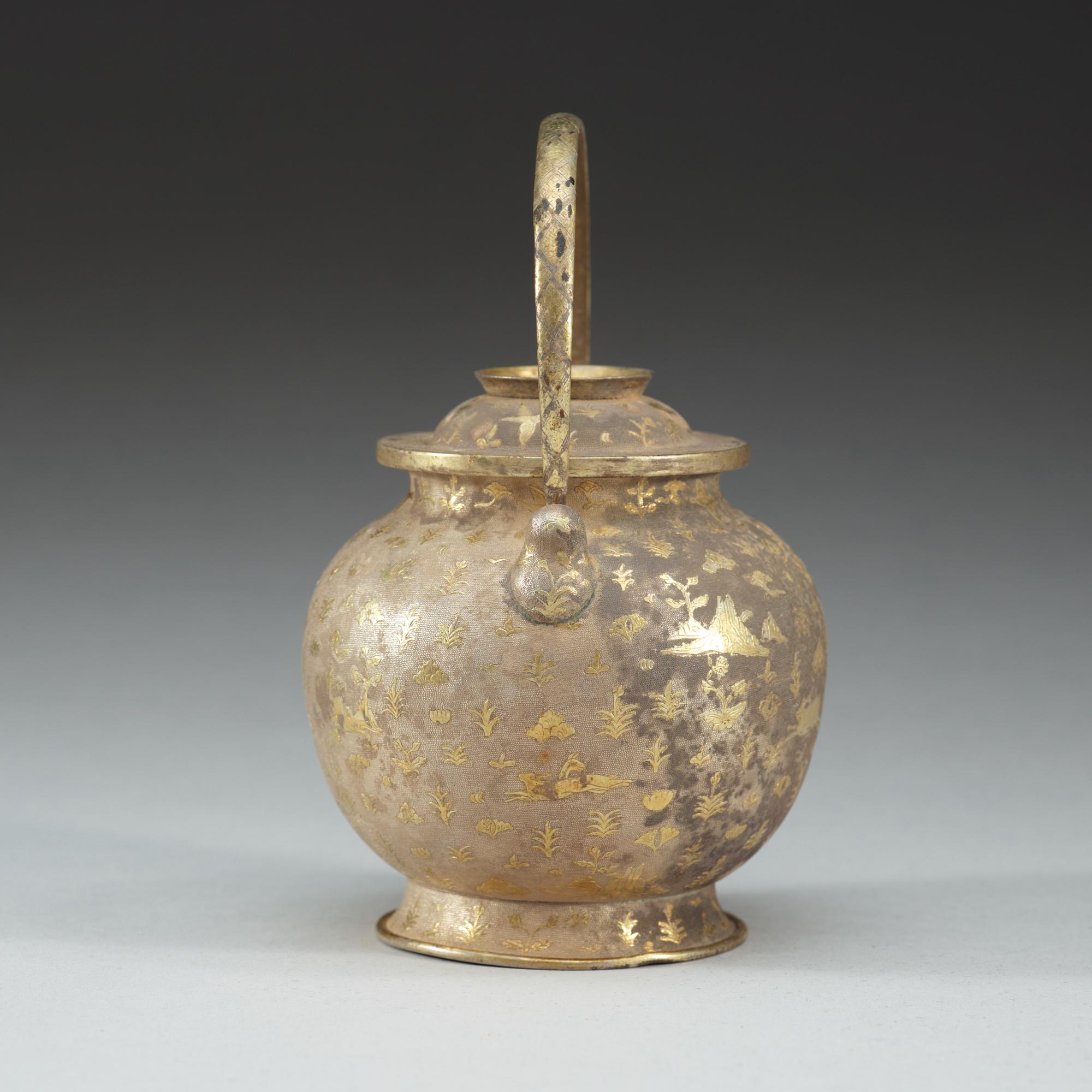 A gilt silver jar with cover and handle, presumably Tang dynasty.