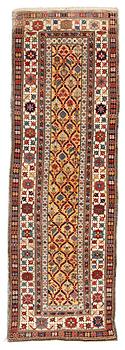 220. A RUNNER, an antique Kuba, ca 289,5 x 97 cm (as well as the ends with 1 cm light blue soumak).