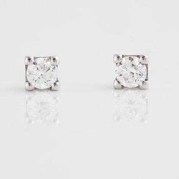 A pair of brilliant-cut diamond earrings. Total carat weight 0.48 cts.