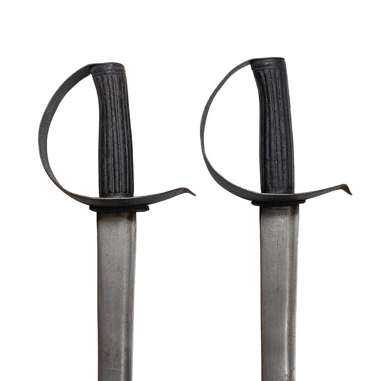 Two 19th century naval cutlasses.