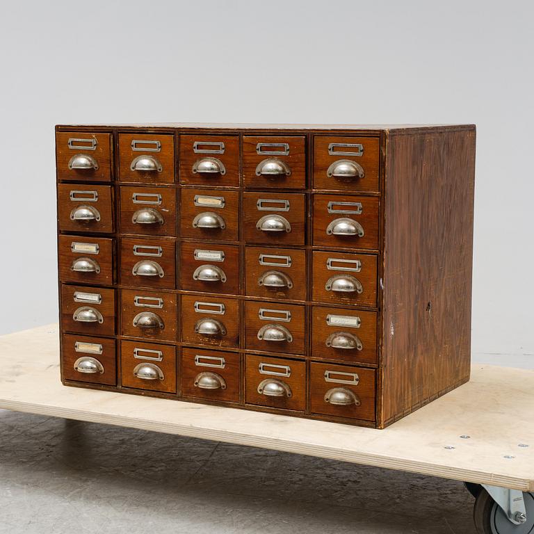 A pine cabinet with drawers, first half of the 20th Century.