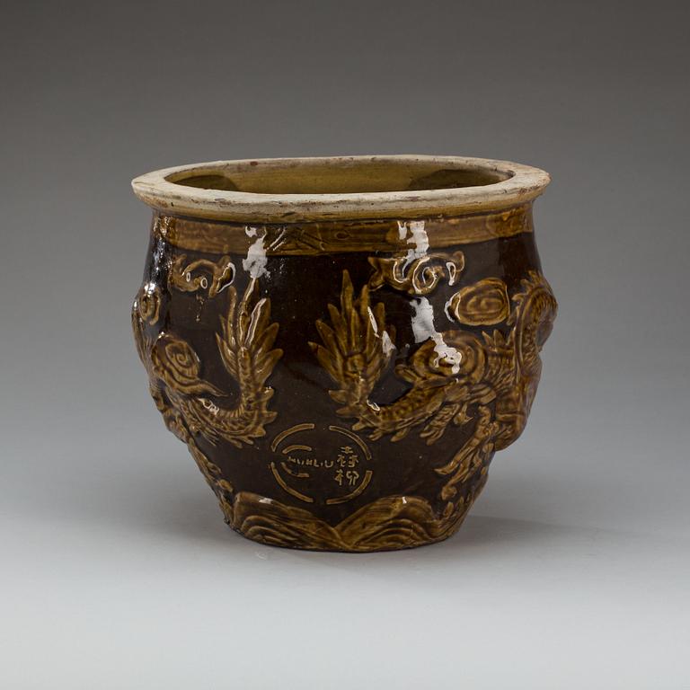 URNA, lergods, Kina, 1900-tal.