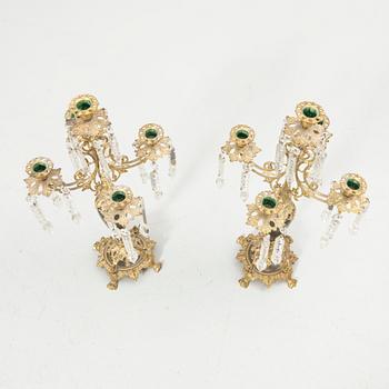 Pair of candelabra and a firedog, 18th/19th century.