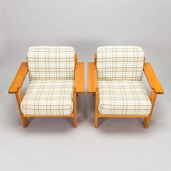 A pair of 1970's armchairs.