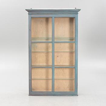 A painted display cabinet, 20th Century.
