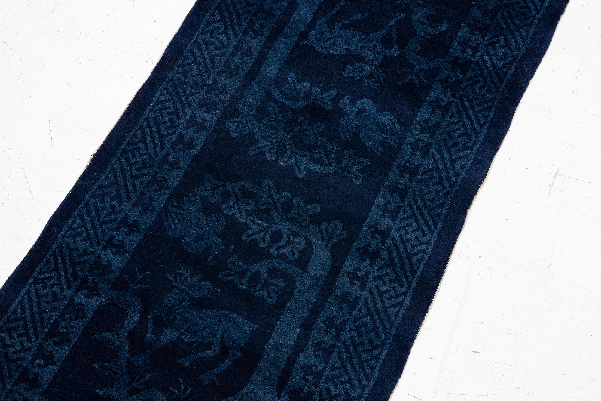 An antique Baotou rug, North China, c 157 x 75 cm.