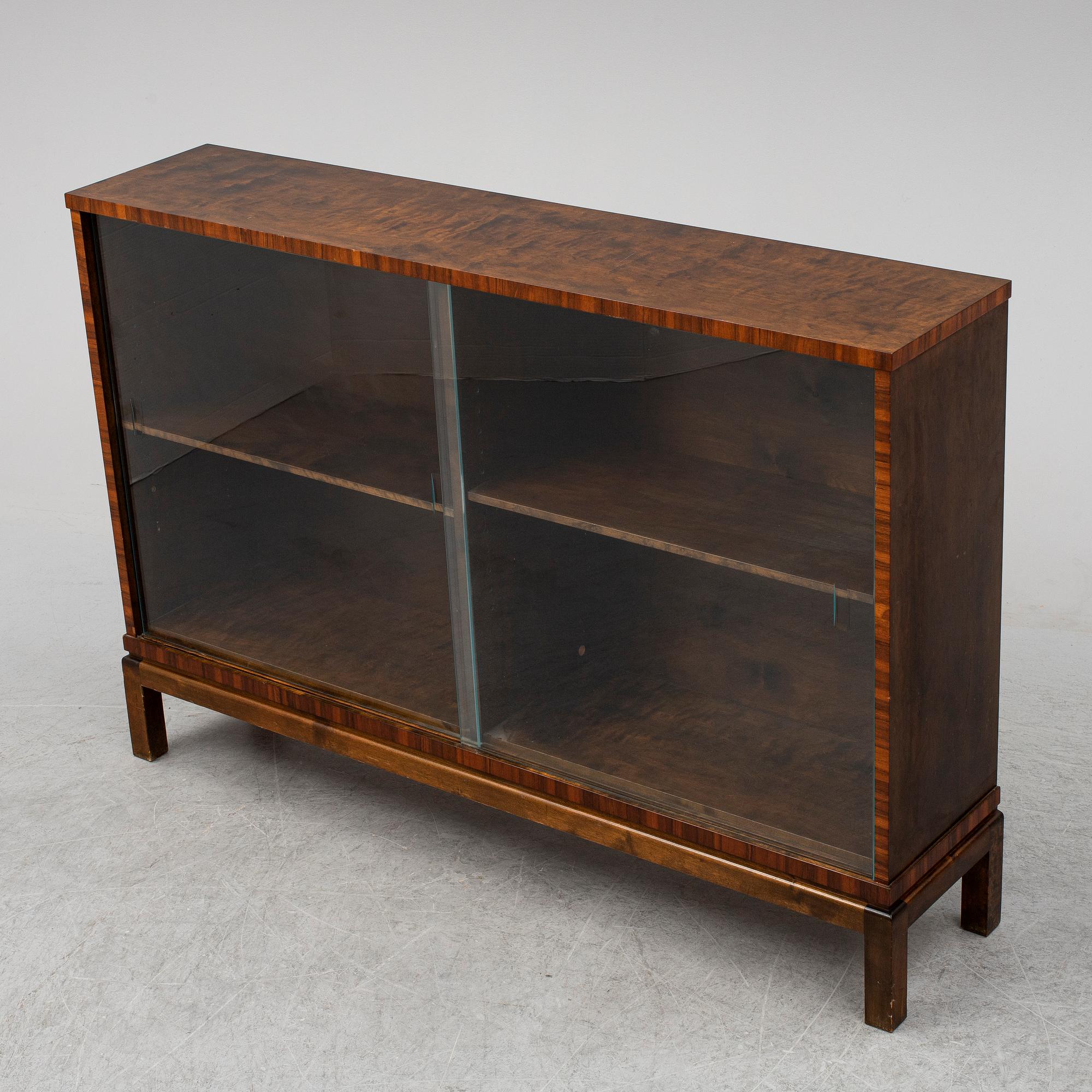 A stained birch veneered bookcase, 1930's.