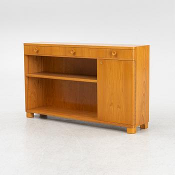 An elmwood-veneered bookcase, Nilsson & Johansson Möbelfabrik, Björnum, mid 20th century.