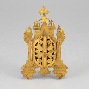 An early 20th century brass icon/frame with Virgin Mary. Possibly Russian.