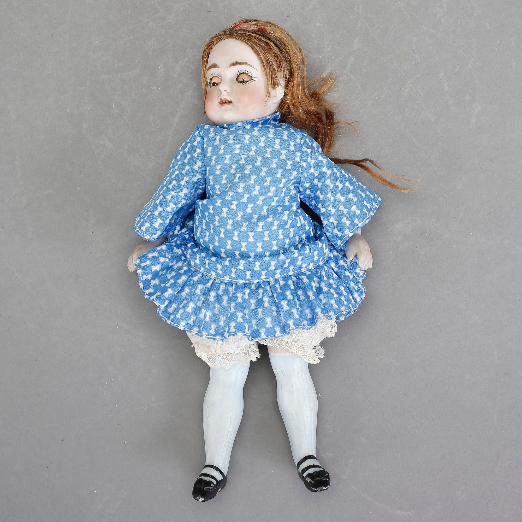 DOCKA, biskviporslin. 1900-talets början.