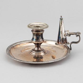 An English 19th century silver-plated chamber-candlestick. Unmarked.