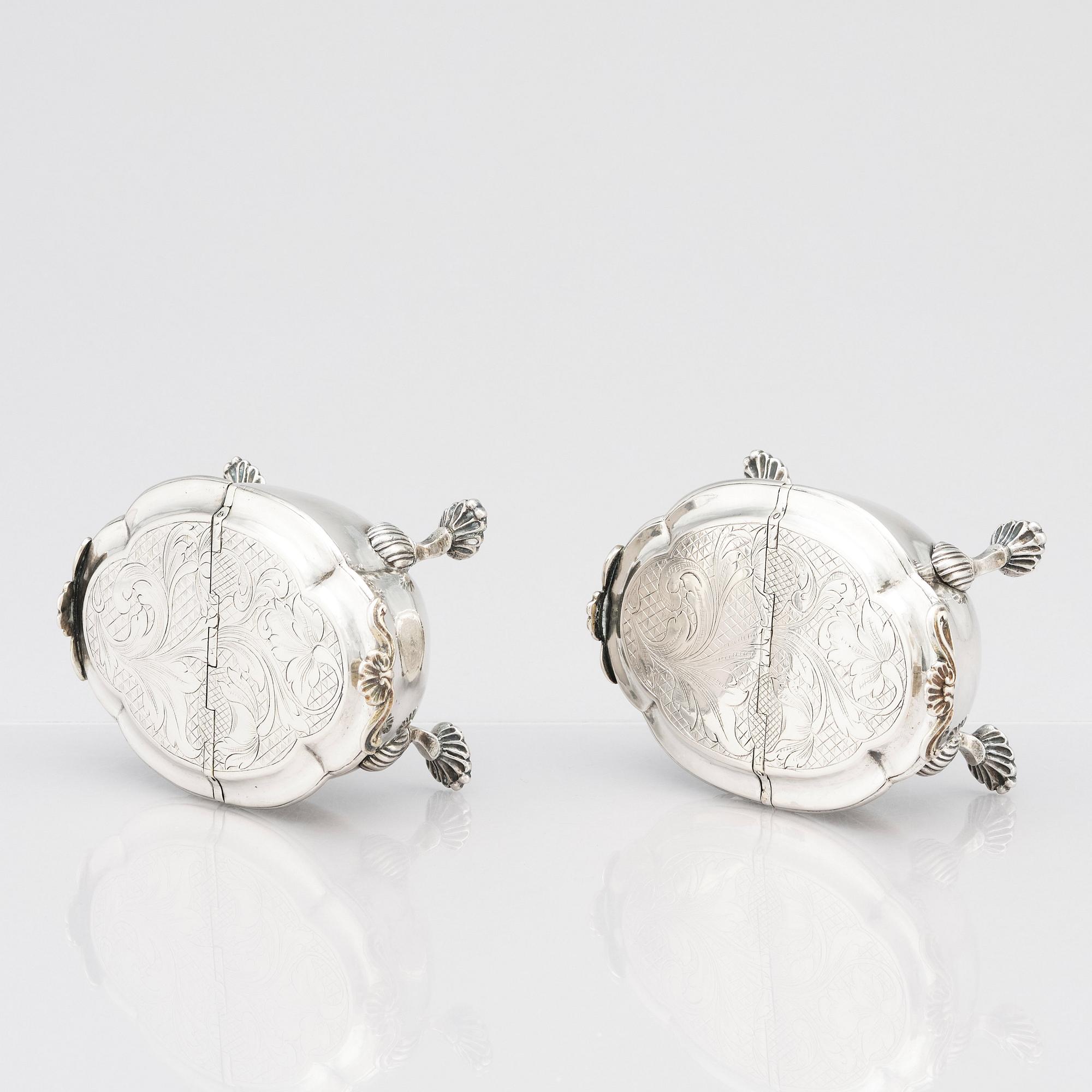 A pair of Latvian Rococo silver salt and pepper stands, marks of Johan Christian Henck (Henke), Riga 1768-80.