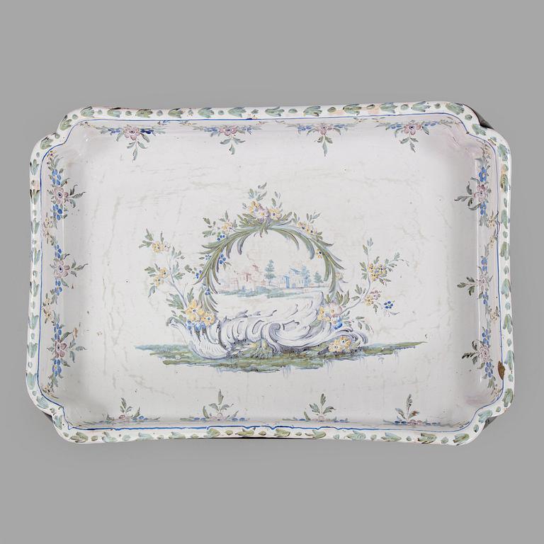 A Swedish Rococo faience tea table, Marieberg 1770.
