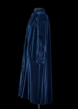 A blue velvet coat by Yves Saint Laurent, from the Russian collection.