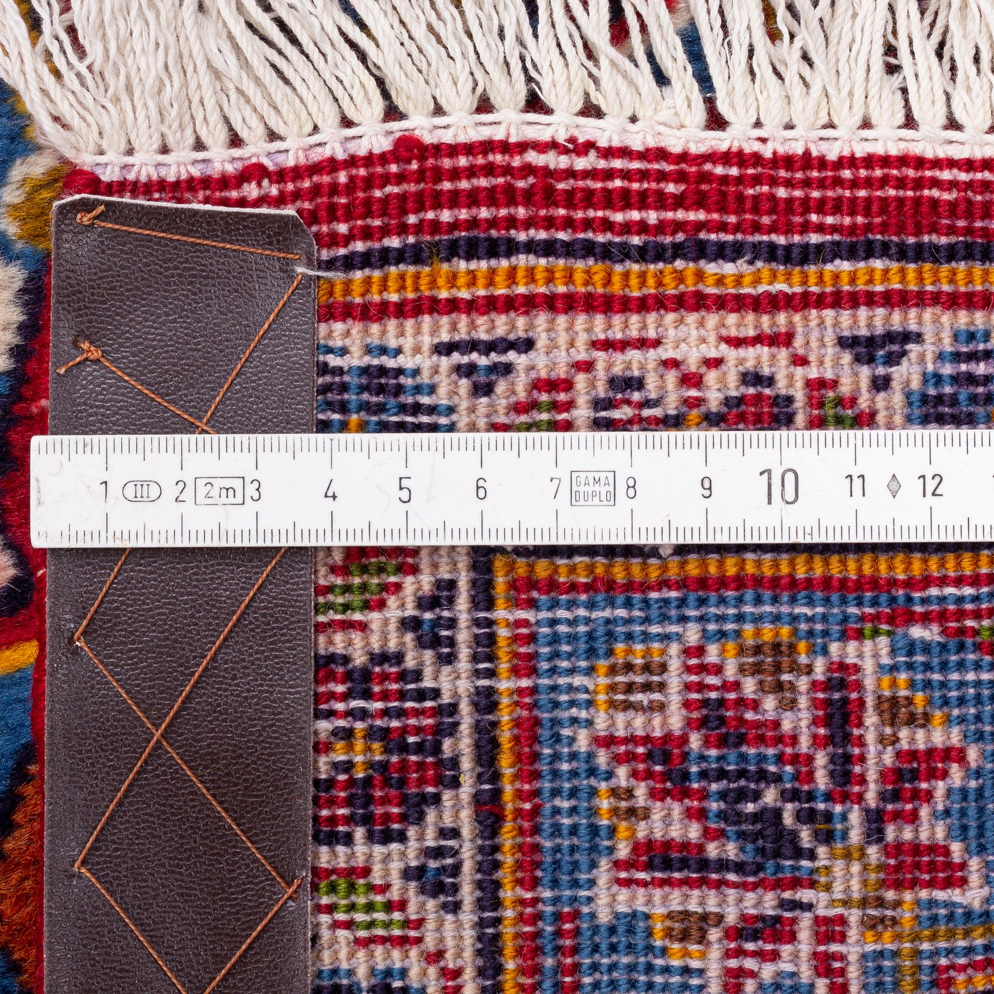 A Kashan carpet signed, approx. 420 x 292 cm.