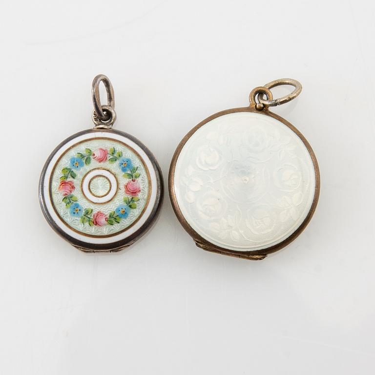 Two pendants and five brooches made of silver and enamel, including Aksel Holmsen, Norway, circa 1900.