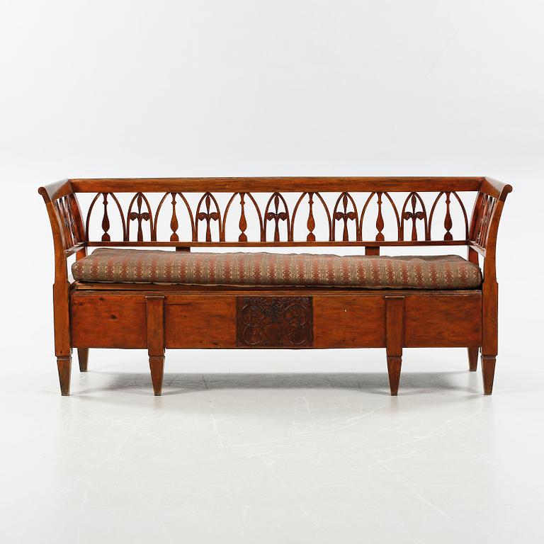 A late gustavian sofa from Lindome, made in early 19th century.