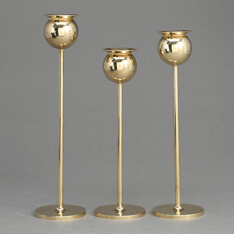 LJUSSTAKAR, 3 st, mässing, "Tulpan", Pierre Forsell, Skultuna, 1900-talets andra hälft.