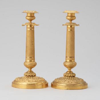 A pair of Russian 1830/40's brass candlesticks.