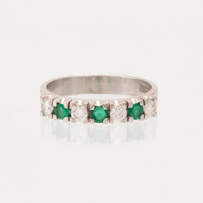 Ring half-eternity 18K white gold with round faceted emeralds and diamonds, Heribert Engelbert Stockholm 1981.