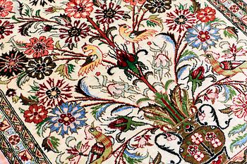 A rug, figural silke Ghom, ca 73 x 57 cm.