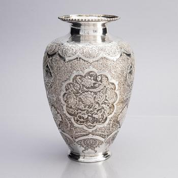 A Persian silver vase, late Qajar dynasty around 1910.