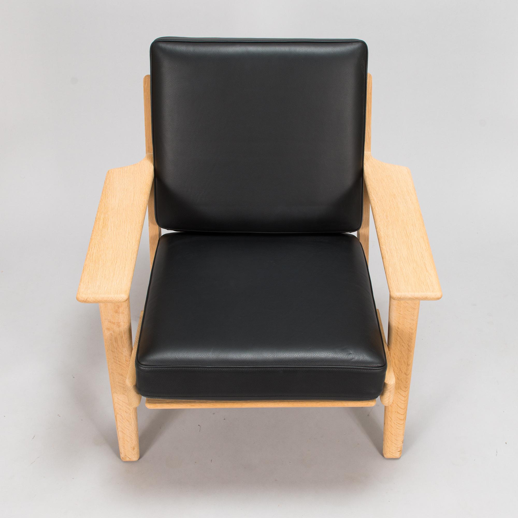 Hans J Wegner, a 2004 'GE-290' armchairs for Getama.