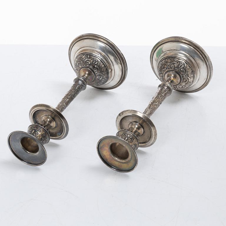 A pair of Swedish silver Renaissance-revival candlesticks, mark of CG Hallberg, Stockholm 1883.