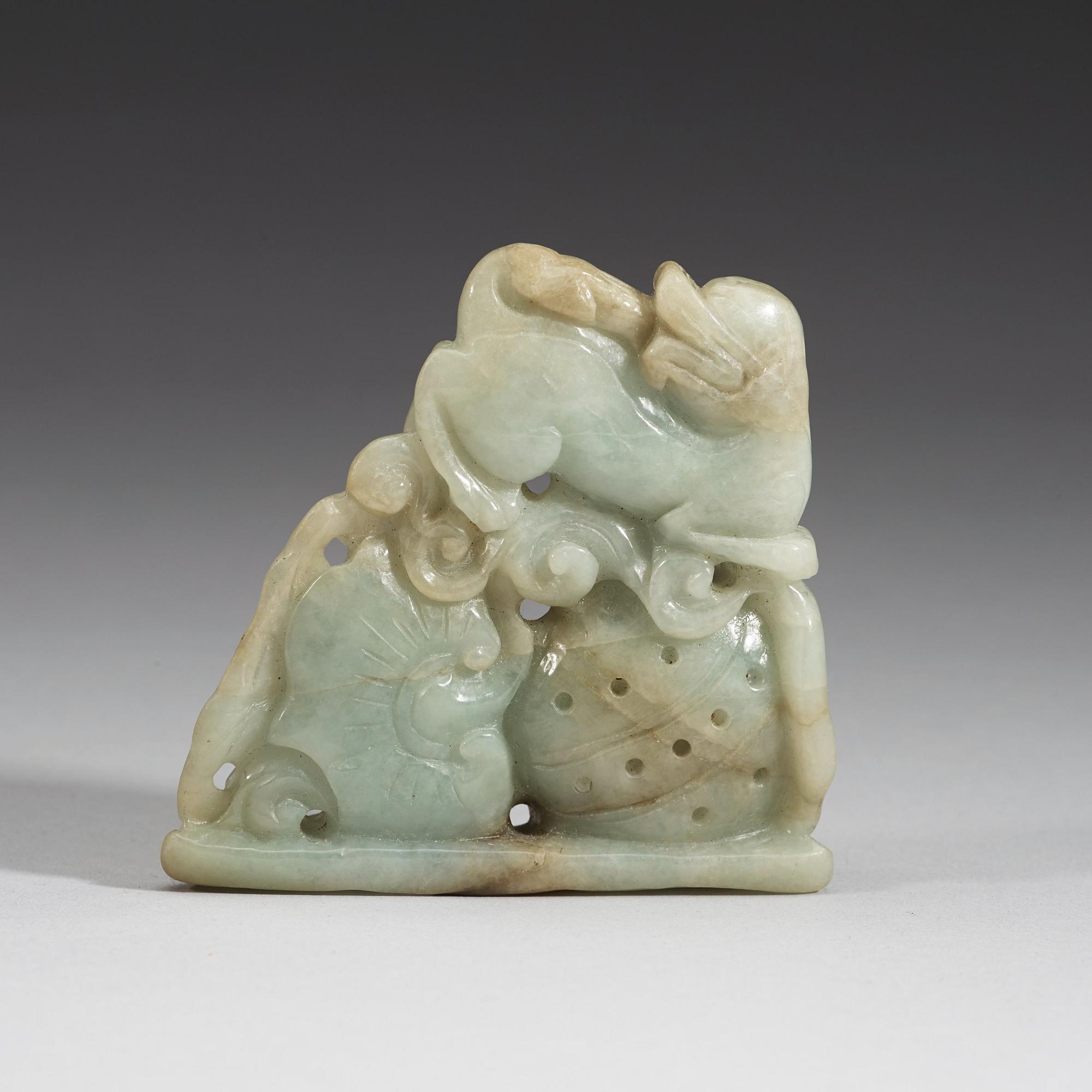A carved nephrite figurine, presumably late Qing dynasty (1644-1912).