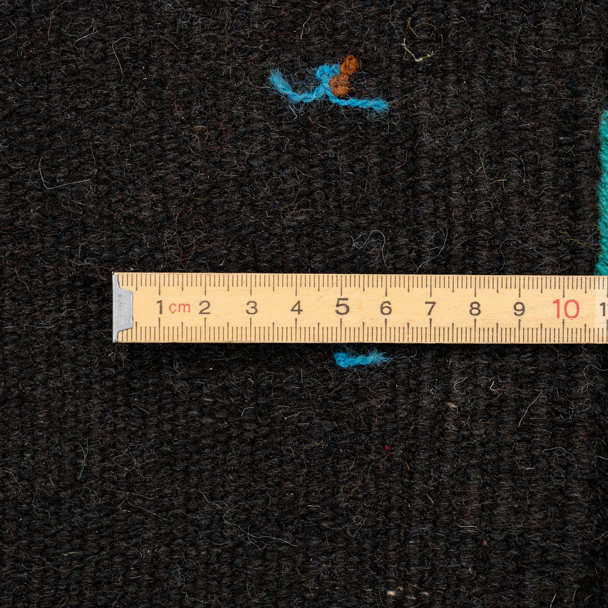 A hand-embroidered Kelim rug, c. 225 x 177 cm.