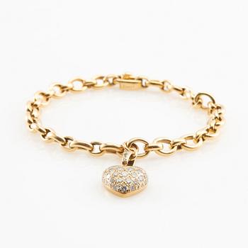 Cartier, Armband av 18K guld med runda briljantslipade diamanter.