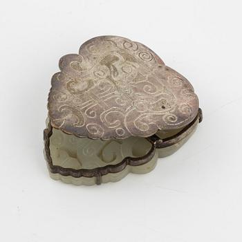 A nephrite and silver-plate clip, China, 20th century.