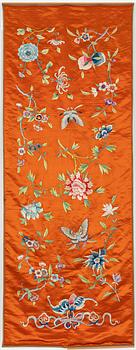 A Chinese embroidered textil fragment, late Qing dynasty/early 20th Century.
