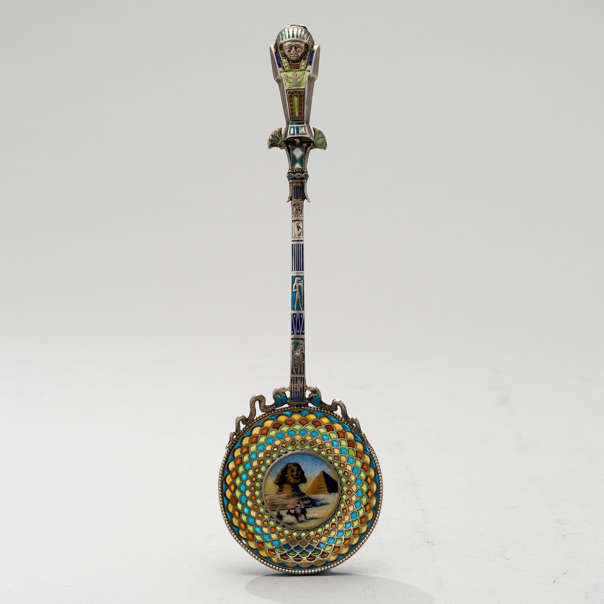 A SPOON, silver and enamel, egyptique revival, 1920s.