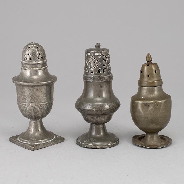 Three 18th century pewter shakers.