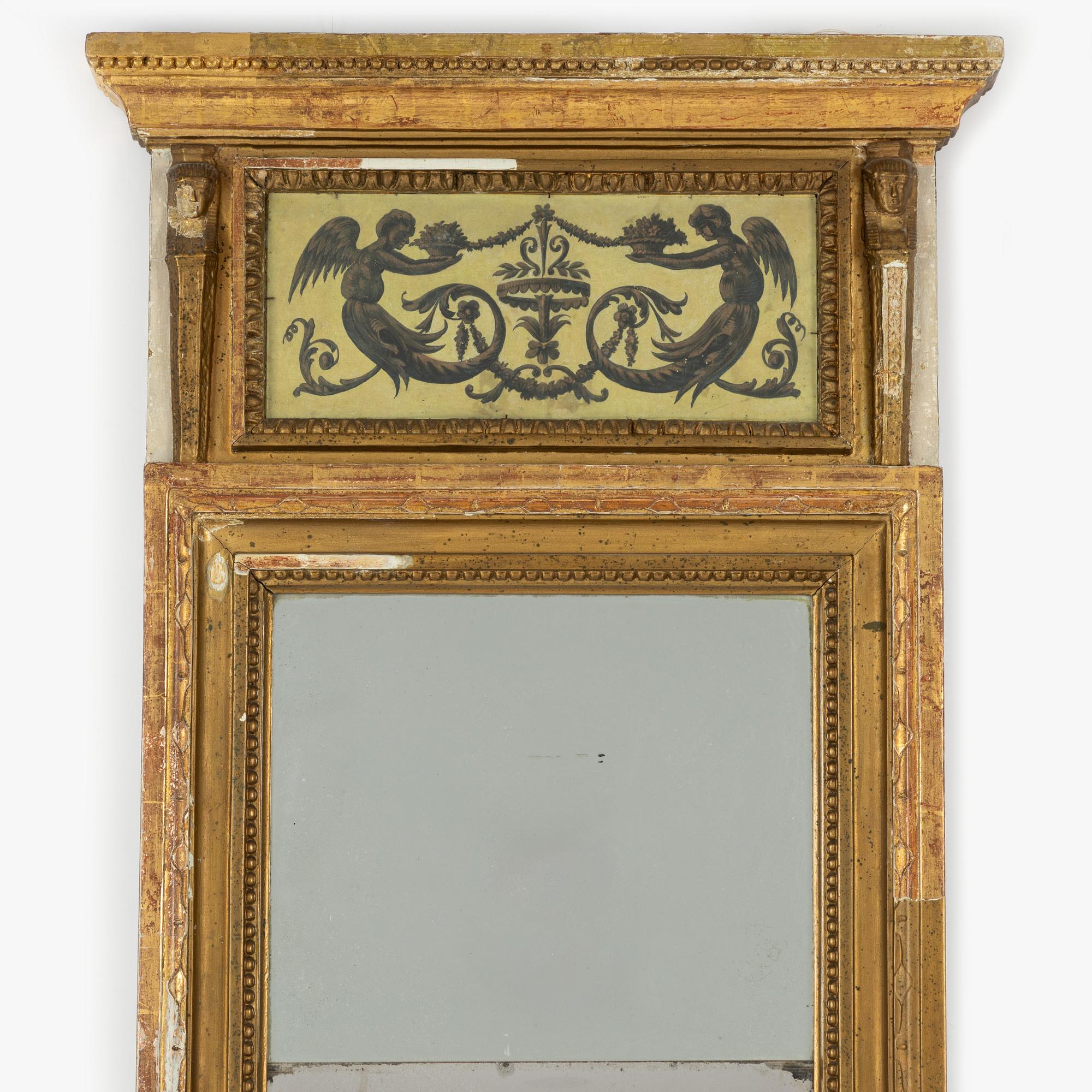 A late Gustavian giltwood mirror attributed to O. Wetterberg (master 1785-1803).
