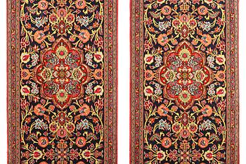 A pair of Quum rugs, c. 176 x 60 cm & c. 178 x 58 cm.