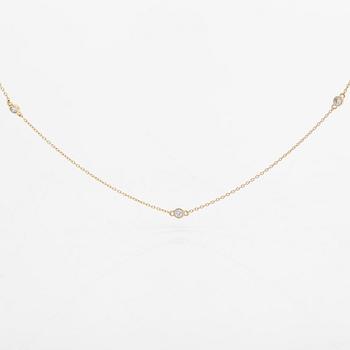 A 14K gold necklace with diamonds ca. 0.15 ct in total.
