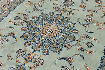 A Keshan carpet, signed, c. 376 x 270 cm.