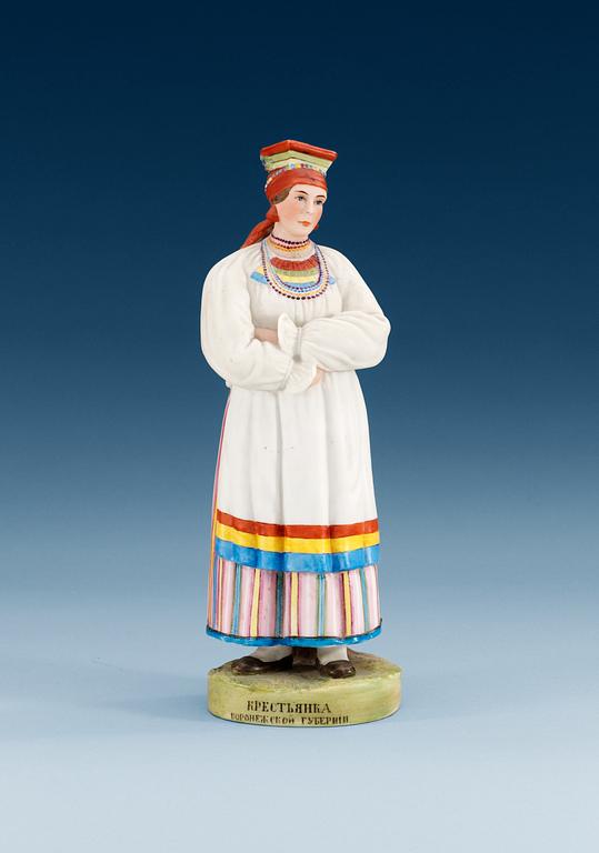 A Russian figure of a peasant woman from the Voronezh province, Gardner manufactory, ca 1900.