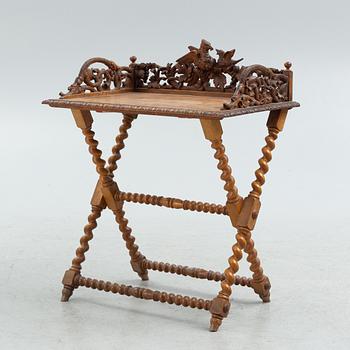 A Baroque-style serving table, circa 1900.